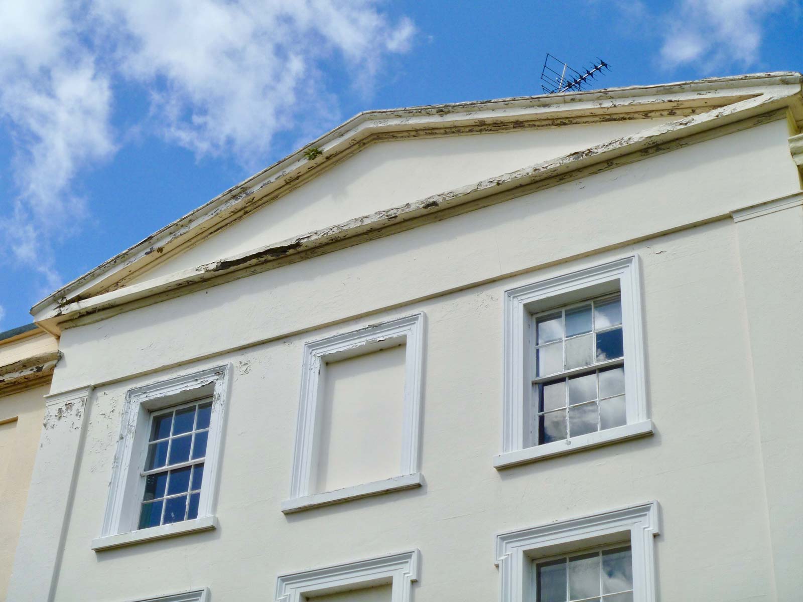 Dilapidated facade of house